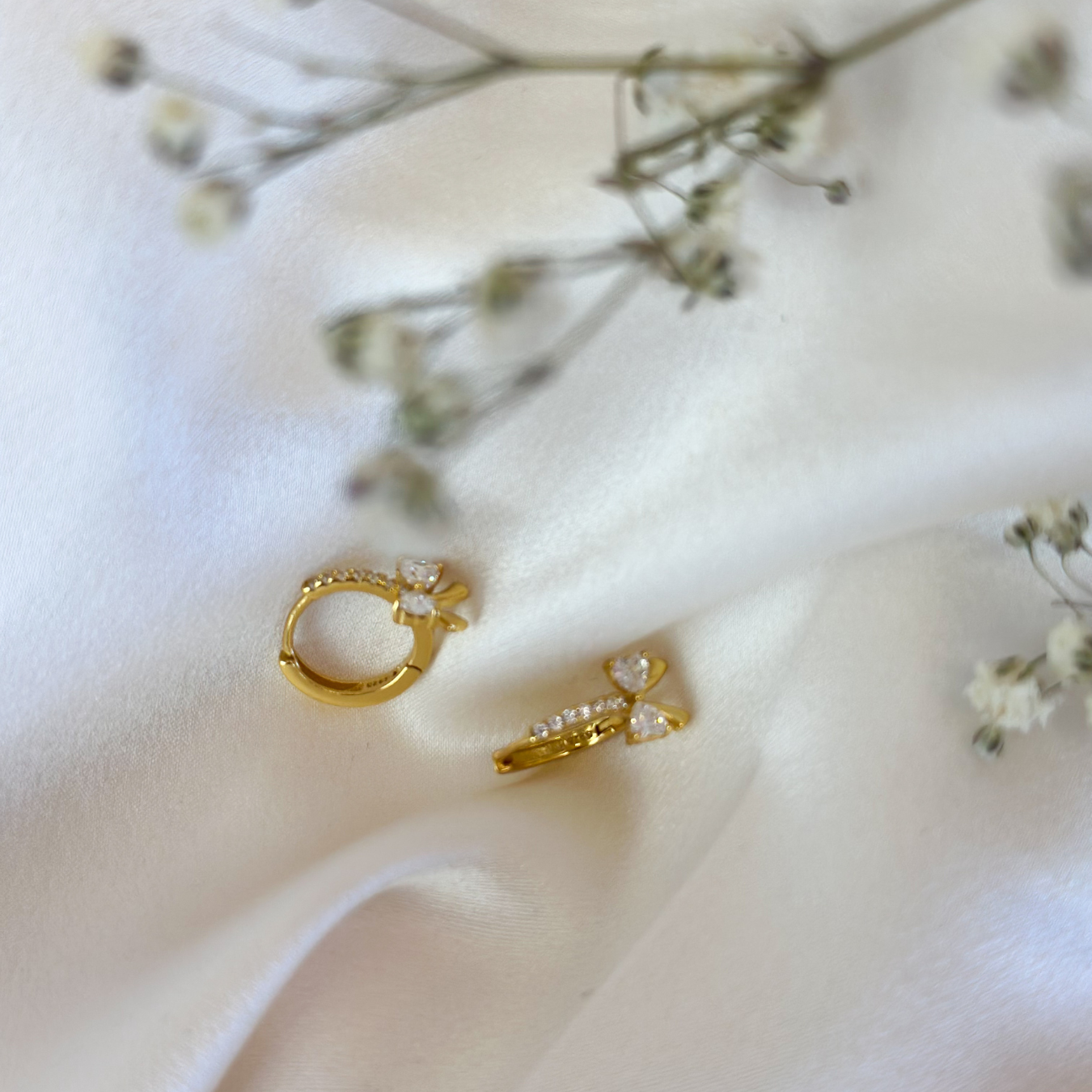 Bow Hoops Ohrringe aus Sterling Silber